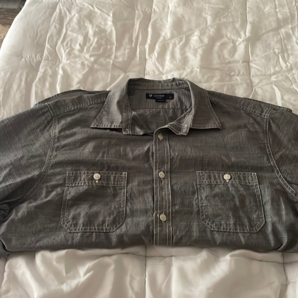 Men’s navy and white short sleeve button up shirt.